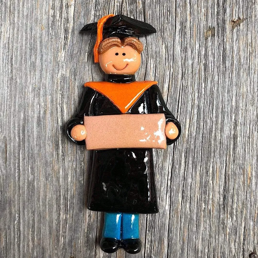Orange and Black Graduate